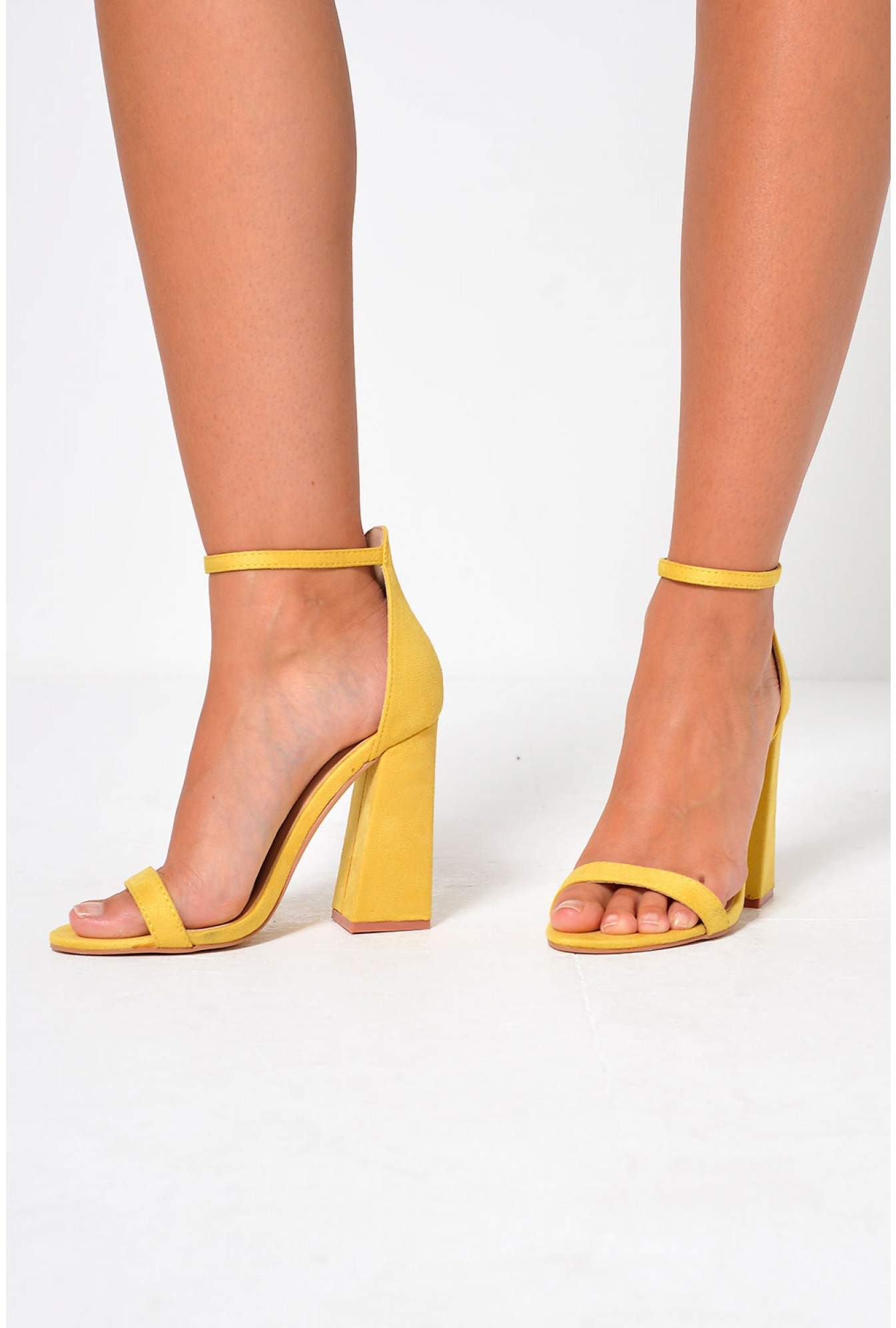 Yellow strappy heels